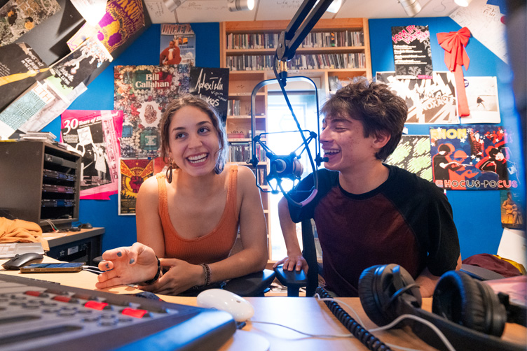 Students broadcasting from the KWUR studios in the Harvey Media Center